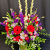 Large tall vase of flowers for a Celebration of life or memorial