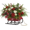 White spray roses, miniature red carnations, and white button spray chrysanthemums are