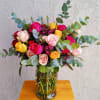 Beautiful centerpiece decorated with 36 quality Fresh roses in different colors: pink