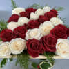 This fresh rose box consists of 22+ fresh glitered red and white