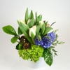 A simple garden inspired design with tulips and fragrant hyacinth and hydrangea.