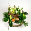 White tulips, hyacinth and fresh pine, cedar and noble fir accented with