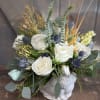 This arrangement is the perfect hostess gift for Thanksgiving festivities! Flowers included