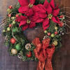 A PERFECT HOLIDAY GIFT....This 24&quot; silk Christmas Wreath is adorned with Poinsettias