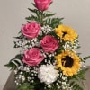 Lovely floral arrangement of pink premium roses, white carnations, baby&rsquo;s breath flowers