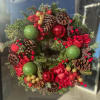 Assorted evergreens with Christmas decorations.
Approximated size: 24&quot; 