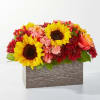 This arrangement will have you dreaming of autumnal spices with rich red