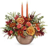 Joyfully welcome the harvest season with this magnificent centerpiece of fall blooms