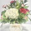 Ho Ho Ho!! Santa Planter with fresh winter greens, hydrangeas, peppermint carnations.