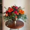 Perfect for your Thanksgiving dinner. A mix of sunflowers, gerbera daisies, roses