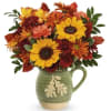 Autumn Acorn Pitcher by Teleflora - Standard. An arrangement by Sueppel&#039;s Flowers.Description
Bursting