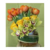 Cute, modern and simple bouquet of orange tulips, yellow roses, and green