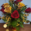 1 dozen Rose&#039;s in red and gold in a matching vase with