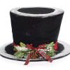 Black felt hat tree topper accented with red ribbon band, sprigs of