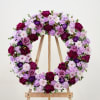 Express your heartfelt condolences with the Deepest Sympathy Wreath, thoughtfully arranged with