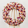 The Garden Rose Wreath brings a delicate and luxurious touch to any