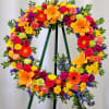 Celebrate joy and creativity with the Colorful Life Wreath. Its vibrant mix