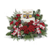 xmas greens, roses, carns and berries Makes a beautiful centerpiece and a