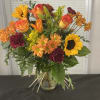 This beautiful blend of fall colors and flowers will bring a cozy
