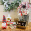 This standard Christmas Bouquet gift basket includes a gnome, a two piece