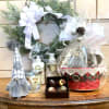 This deluxe Peace on Earth gift basket includes a gnome, a four