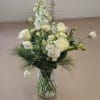Soft, elegant, and refreshingly timeless, this all-white arrangement brings natural beauty to