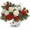 Illuminate the season with this vibrant Christmas bouquet, housed in a festive