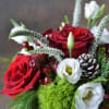 A hand-crafted unique holiday design with the best and freshest flowers available.