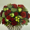 RED ROSES, GREEN HYPERICUM BERRIES, RED SPRAY ROSES, ASSORTED CHRISTMAS GREENS, SALAL