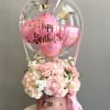 Soft and enchanting, this birthday arrangement overflows with blush hydrangeas, pastel roses