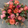 Pomegranate pinks, coral, orang, peaches  with touches of fall foliage in