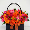 The Bag of Vivid Bloom is a striking, contemporary arrangement designed for
