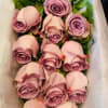 Old school glamour is what this box of lavender roses will convey!