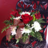 Our best selling product- with a Christmas theme! Fresh fragrant blooms are
