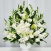 This elegant one-sided altar arrangement showcases graceful white lilies, roses and hydrengeas