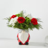 Gnomes are jollier than ever this holiday season. This novelty ceramic vase