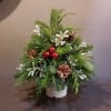 Celebrate the season with this assortment of evergreens created for your table!
Adorned