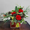 Wrap the holidays with a gift box arrangement of lush pine evergreens