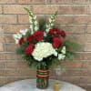 This vase arrangement will bring the feel and smells of Christmas into