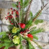 Clear Vase filled with Miniature Green hydrangea, pheasant feathers, ilex berries birch