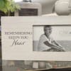Whitewash wood picture frame.
Saying &quot;remembering keeps you near&quot;