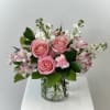 The At The Ballet bouquet has pink alstroemerias, pink roses, white stock
