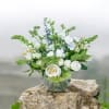 Elegant all white and green centerpiece 
