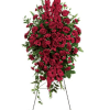 Express your heartfelt sympathies with this magnificent spray of all-red floral favorites.