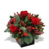 Christmas Greens,  Red Roses, Hypericum Berry, and Holiday Accents arranged into