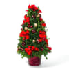 Tabletop Boxwood trees, decorated with an assortment of Christmas and holiday decorations.