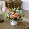 At Last is a breathtaking floral arrangement designed to capture the beauty