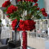 Grand Red Rose Arrangement with Submerged Red Roses in Cylinder Vase.

Approx 3ft