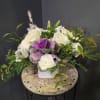 Our Winter Whisper Garden Box is a soft, elegant winter arrangement designed