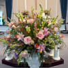 

&ldquo;Springtime Altar&rdquo; is a stunning pastel floral arrangement designed to bring elegance